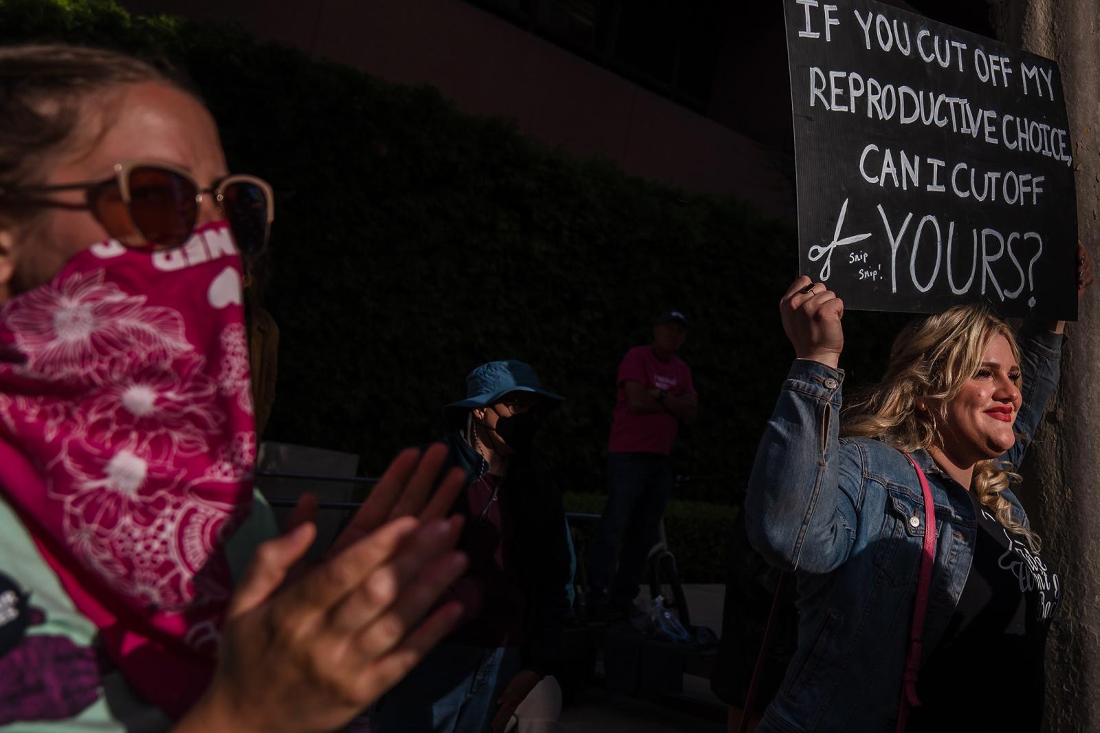 United States - Protesters attend a rally in front of the San Diego...