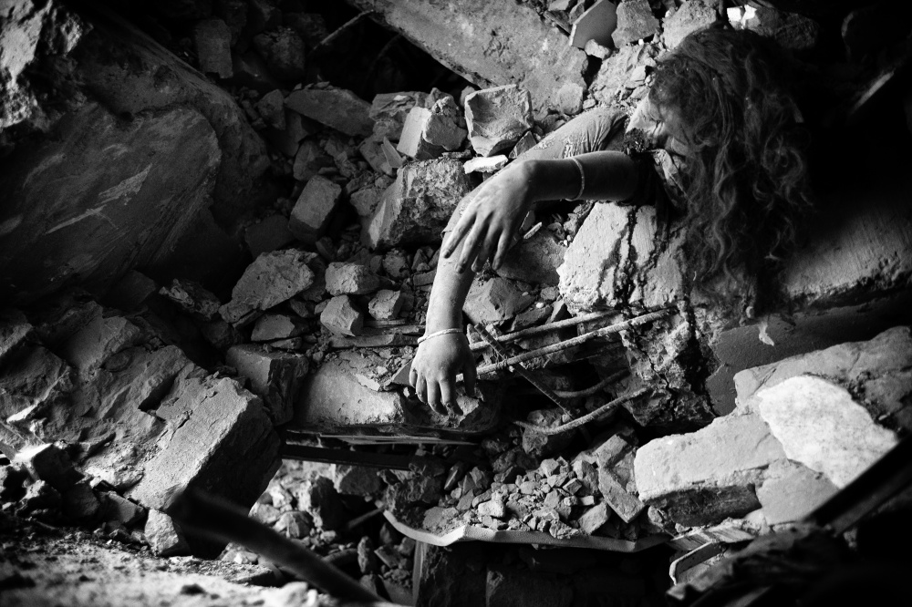 Under the rubble - Body of a female garment worker trapped under the rubble...