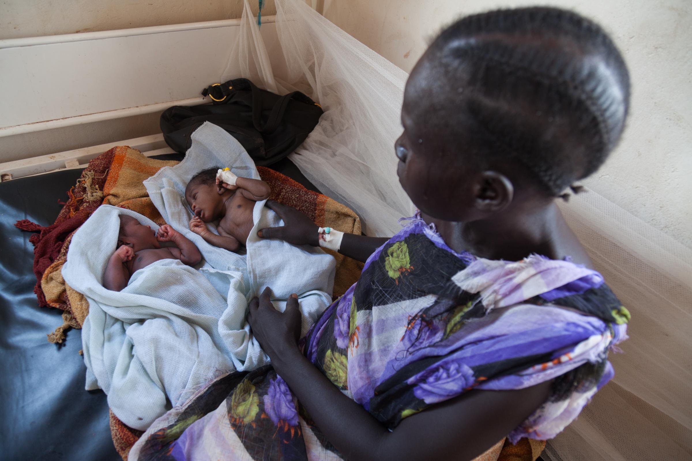CHALLENGES ON THE HEALTH SECTOR - Adut Baak, 30 years old with her one-day twins. She has another 4 children at home and her...