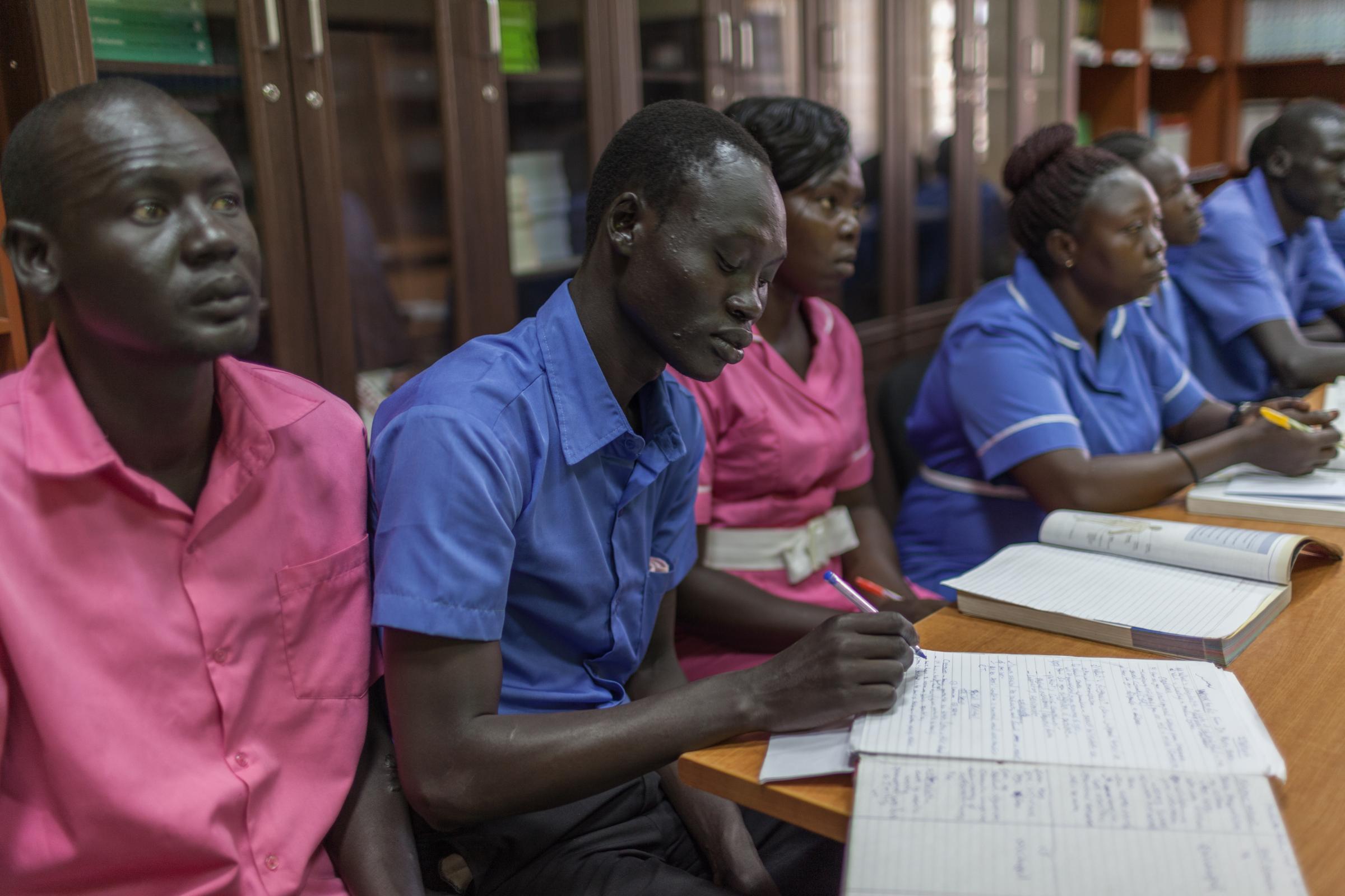 MIDWIVES: BRINGING HEALTH SERVICES CLOSER TO THE PEOPLE - Abraham Koang 29, from Jonglei State (left), Alier John Thon, 25 from Jonglei State (center), and...