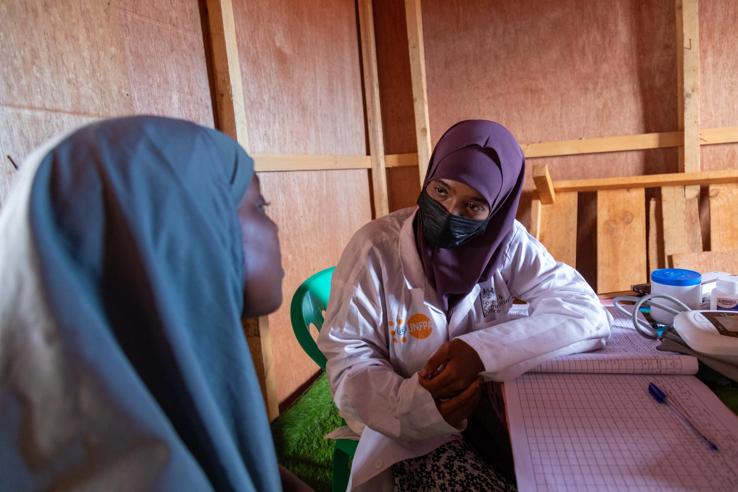 Overcoming Challenges through Healthcare Outreach in Kismayo - Zeina, a midwife supported by UNFPA, compassionately cares for women at the clinic in El JaleIDP...