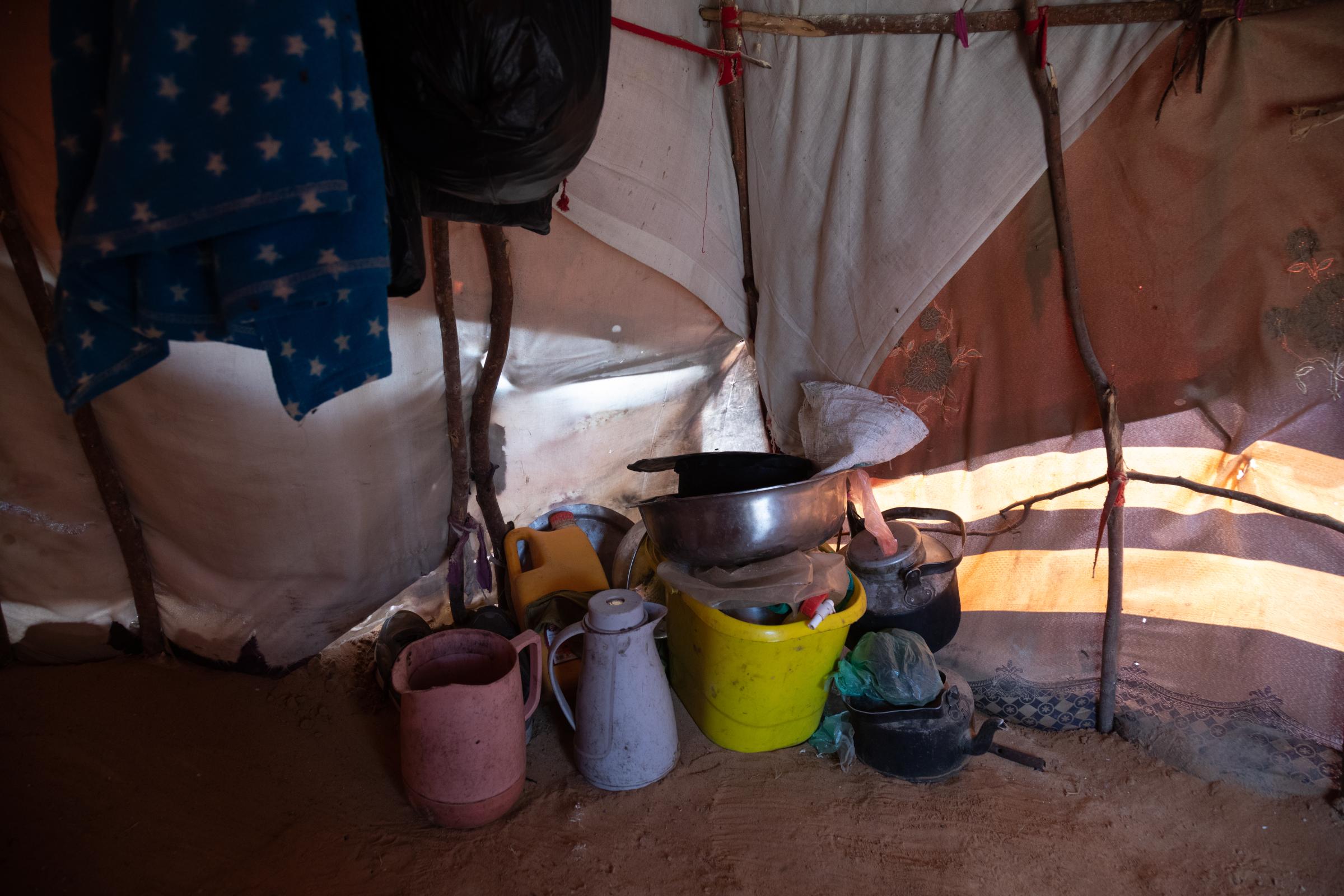 Facing the Dual Crisis: A Glimpse into the Lives of Women and Children in Somalia's Kahda District IDP Camp - Khadio Osman, a resilient mother, fled from the challenges of Lower Shabelle in search of safety...