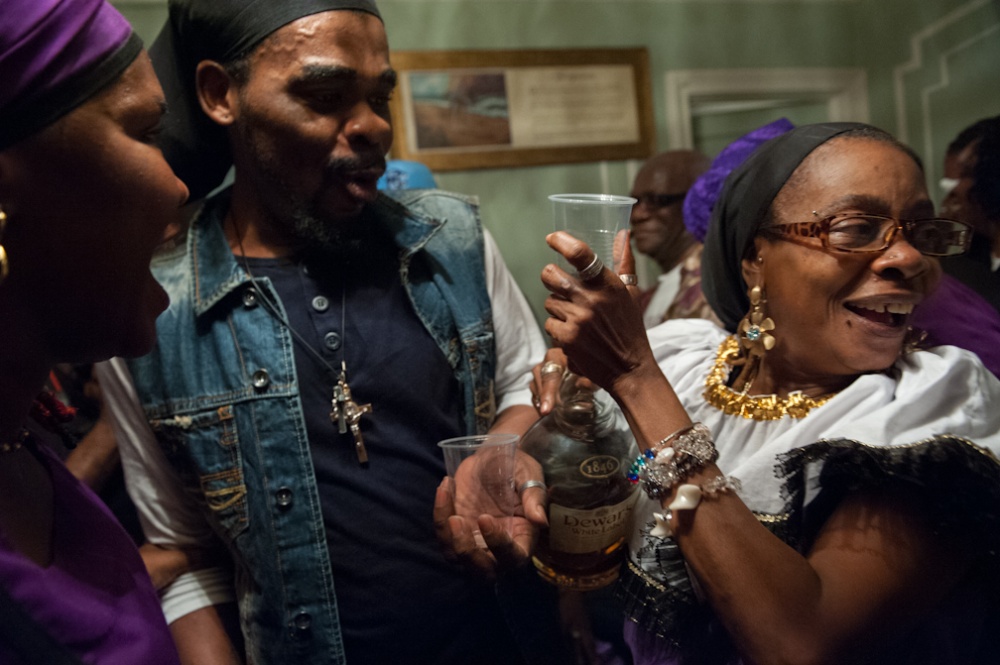 Vodou Brooklyn: Gede -  Libations are passed out during a ceremony celebrated in...