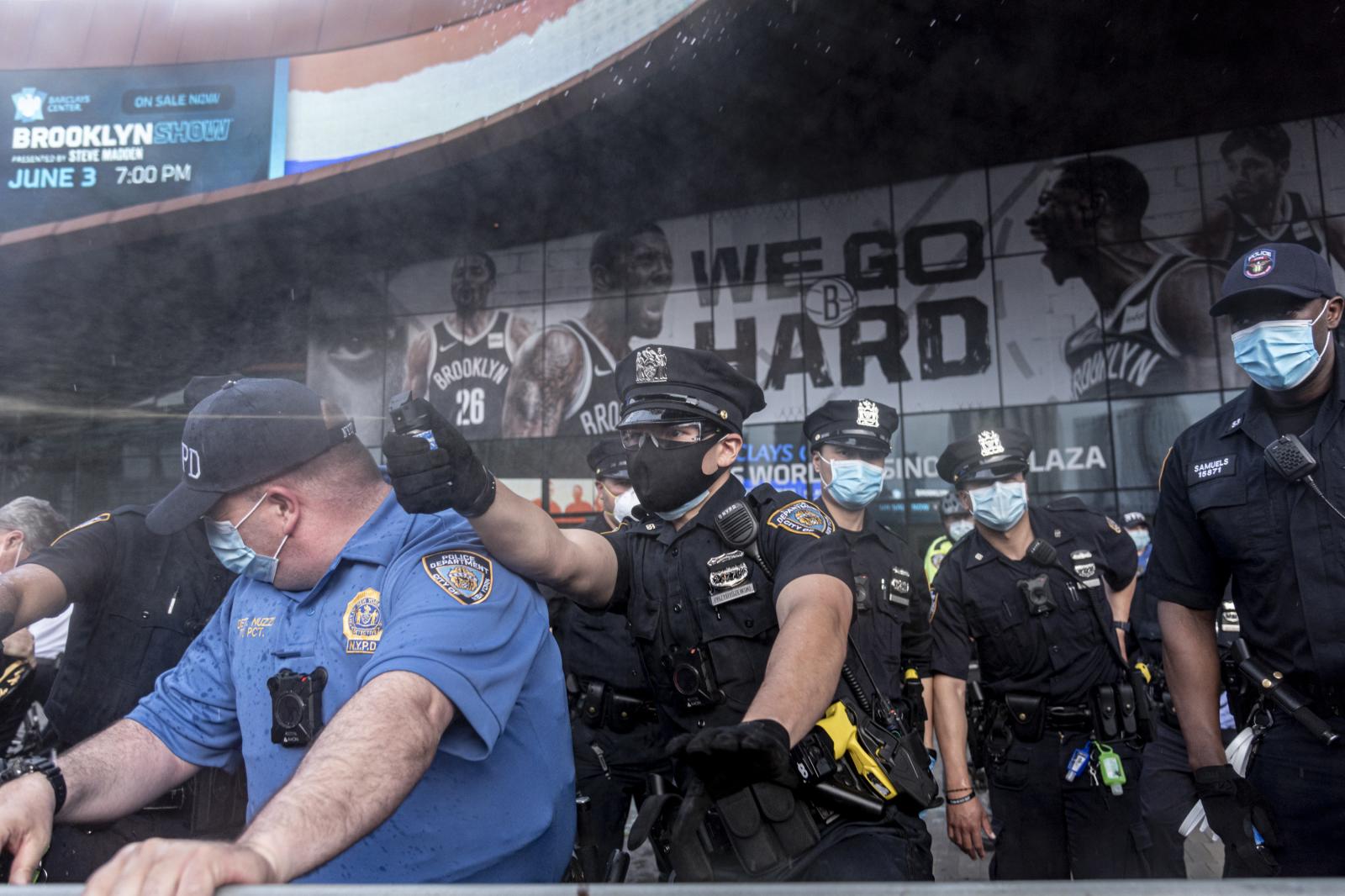 NEWS - Protesters confront the Police outside Barclay's Center...