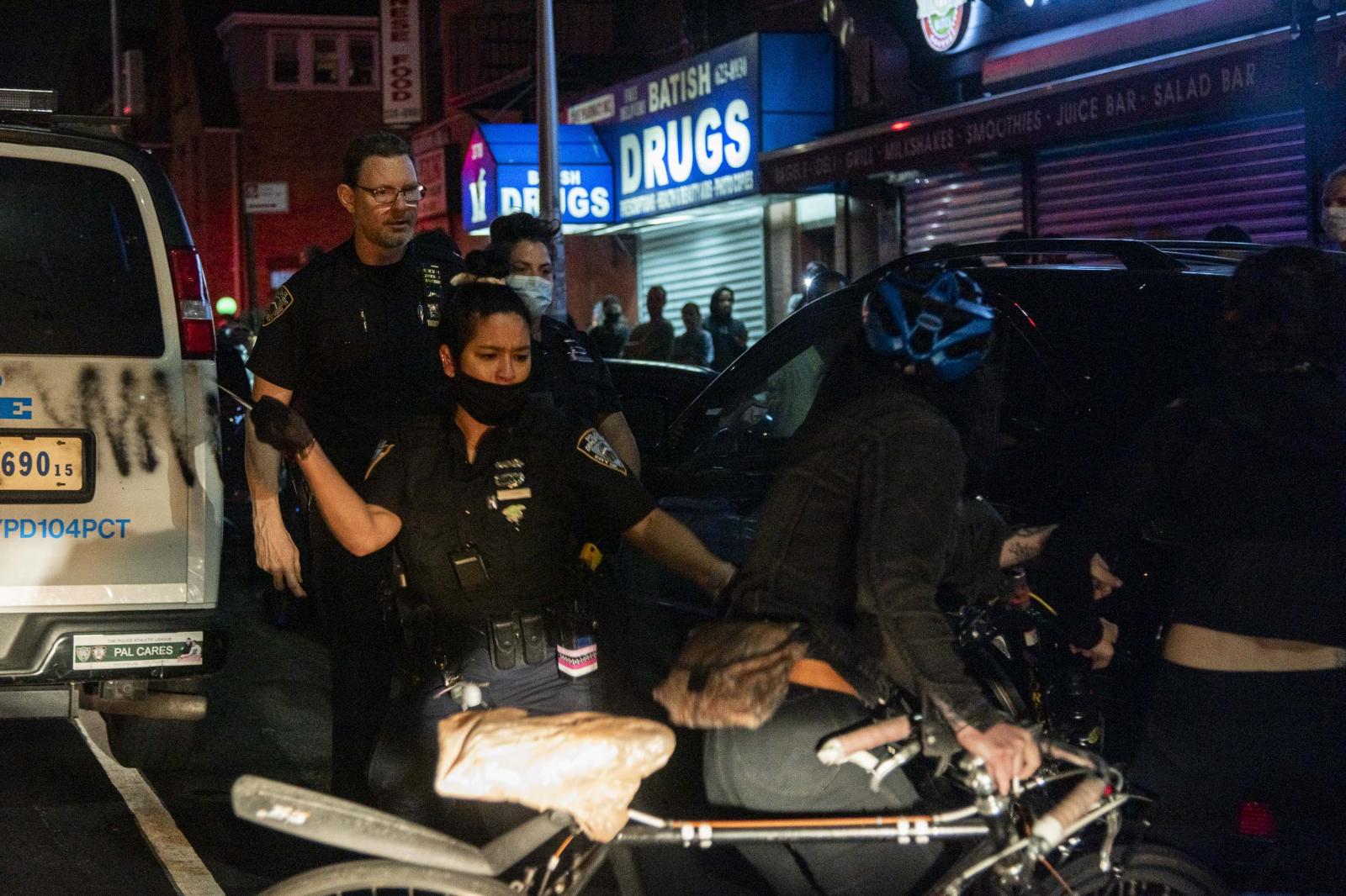 Image from NYC: MidiaNinja - Protesters confront the Police outside Barclay's...