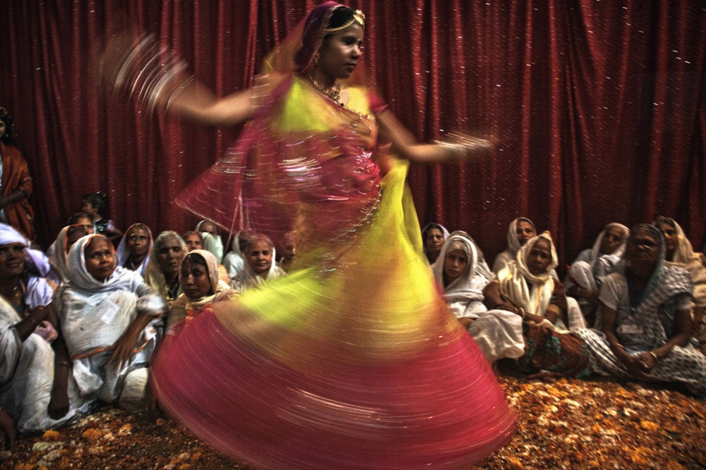 Path breaking move - A woman dances for the widows as part of the programme...
