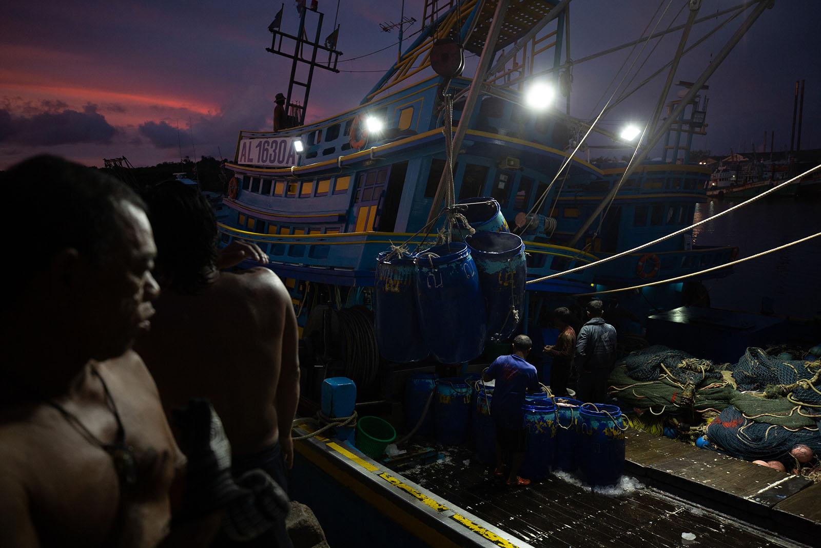 LIFE ON THE OTHER SIDE - Phuket Port, Phuket - At dawn migrant workers from...