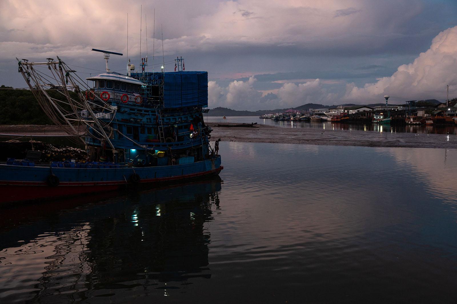LIFE ON THE OTHER SIDE - Phuket Port, Phuket - A migrant worker from Myanmar...