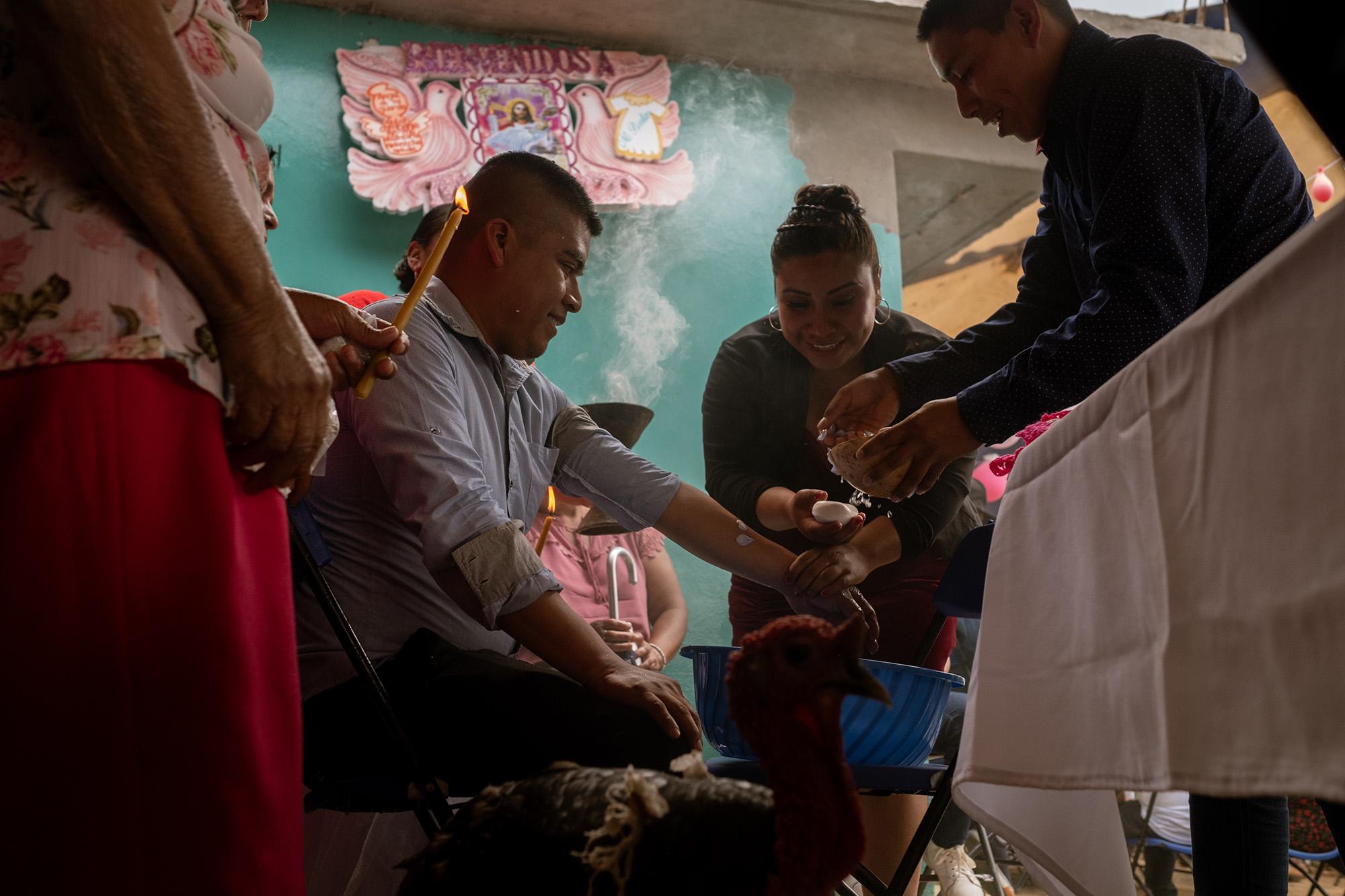 LA TIMES: Mexico may legalize magic mushrooms. Will this traditional medicine lose its meaning? - The Garcia Duran family, relatives of Sabina, celebrate the baptism of one of their youngest,...