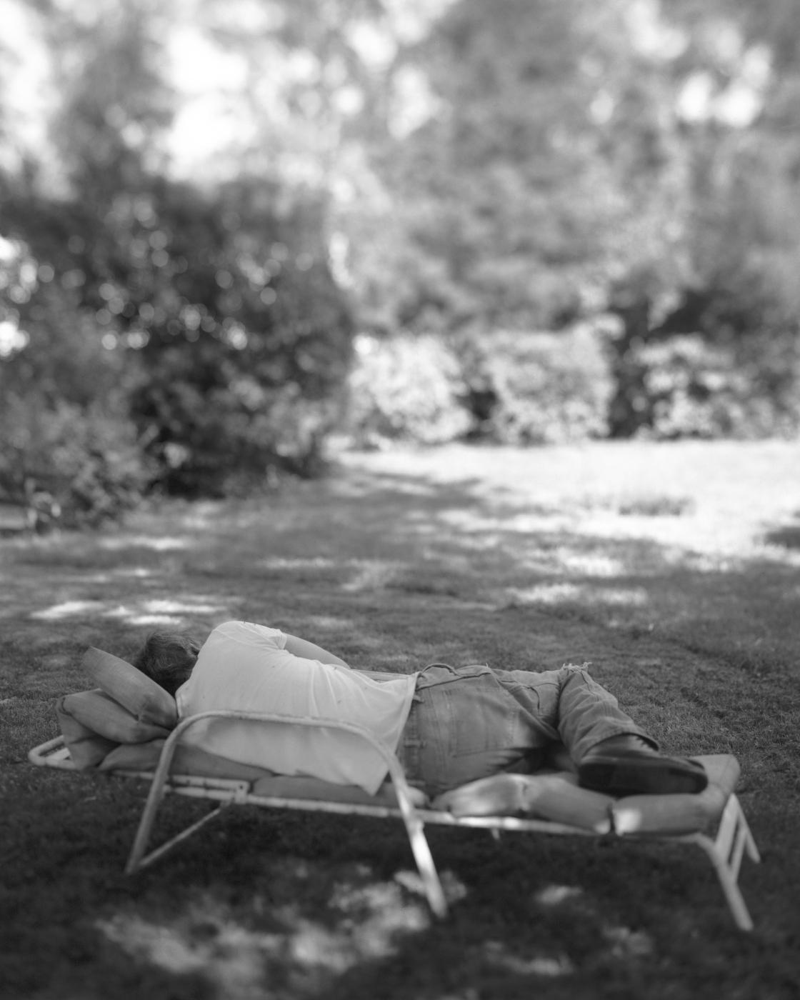 Dad taking a nap in between some yard work, August 2022