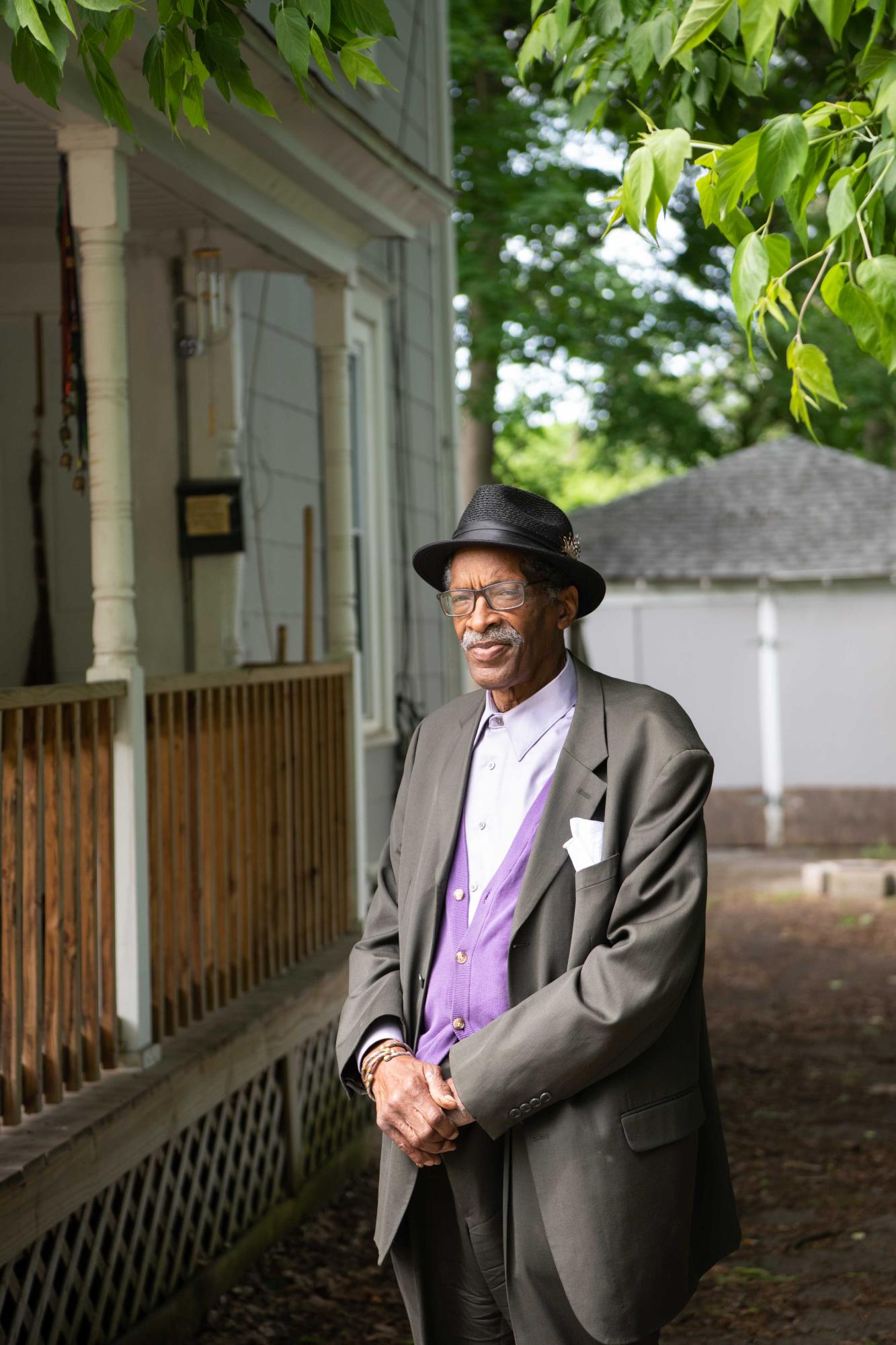 Portraits - Willie Clayton outside his rental property. Ben...