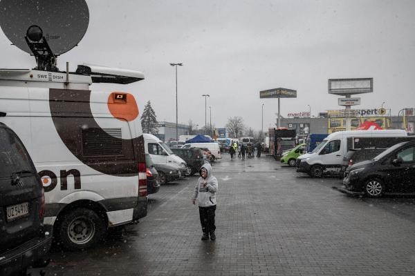 Przemsyl - Milan - From Milan to refugee centers in Poland on the border with Ukraine - A child in the parking lot of the refugee reception center in the Przemyśl shopping center Un...