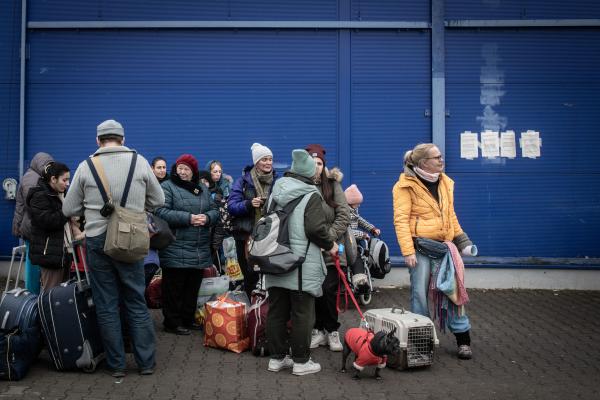 Przemsyl - Milan - From Milan to refugee centers in Poland on the border with Ukraine - Refugees waiting for a bus to pick them up to go to European destinations. _____ Rifugiati in...