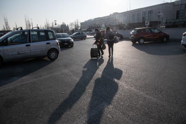 Przemsyl - Milan - From Milan to refugee centers in Poland on the border with Ukraine - Verona. Forecourt of the Porta Nuova station. Vera leaves with her daughter. She is waiting for...