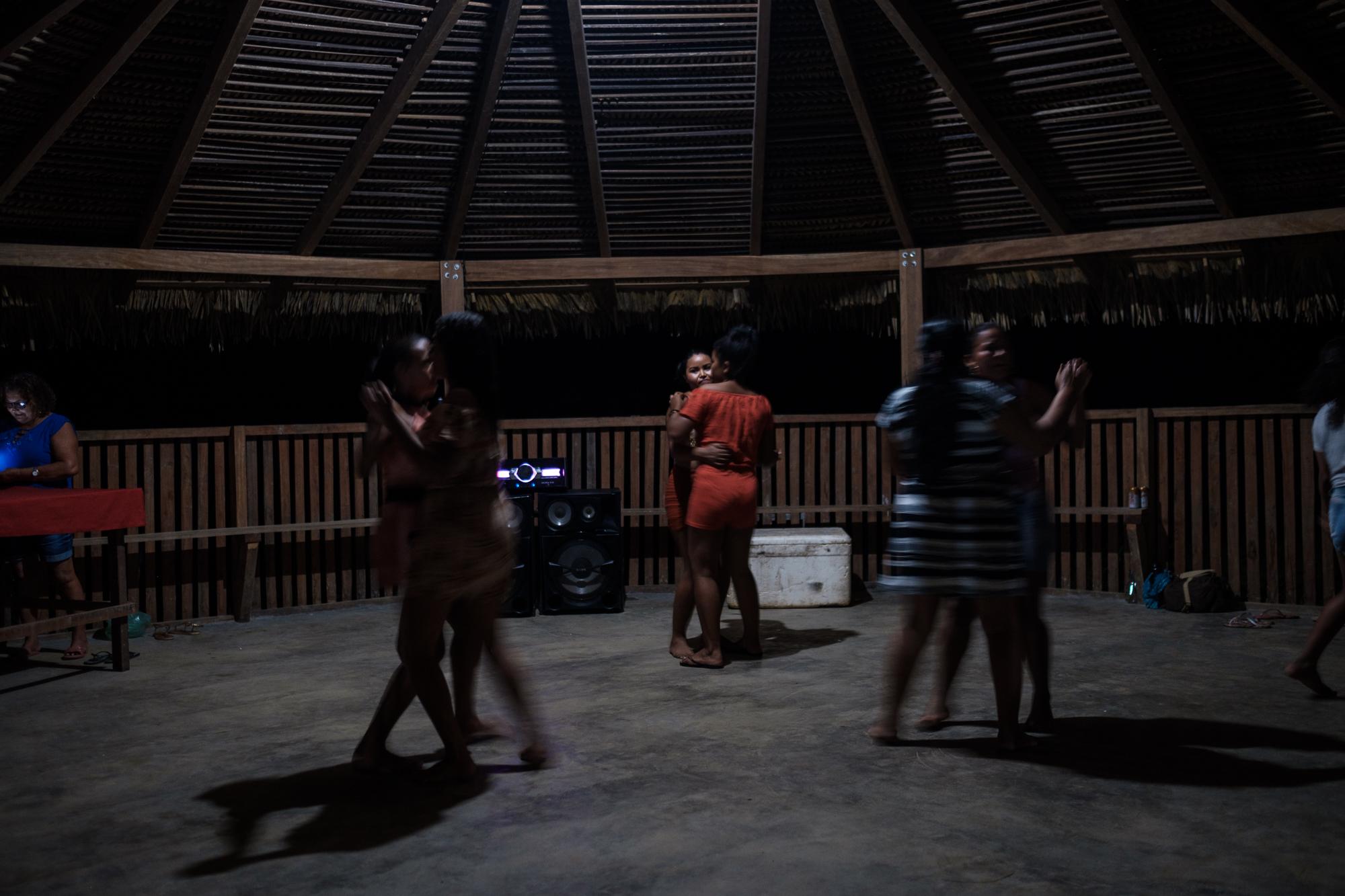 Belo Sun - Women and girls dance at a birthday party for the chief...