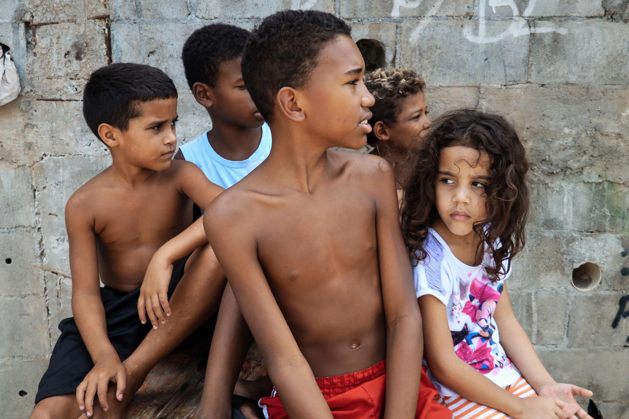 Beautiful and Broken - A group of young kids in the favela Pica-Pau in the far...