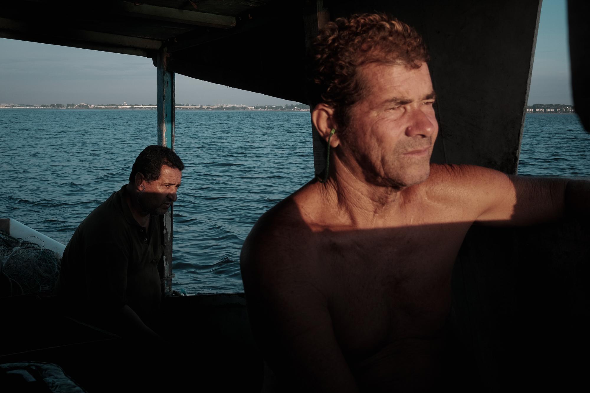 David (l) and Josu&eacute; (r), two artesanal fishermen from Z-11 head out at dawn to try...