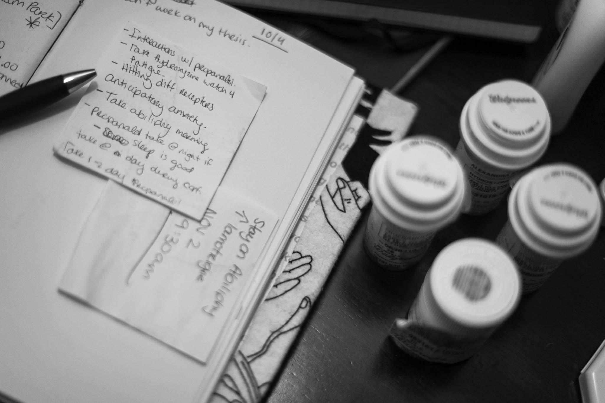 A love letter to self  - My journal lies open next to the different medications I...