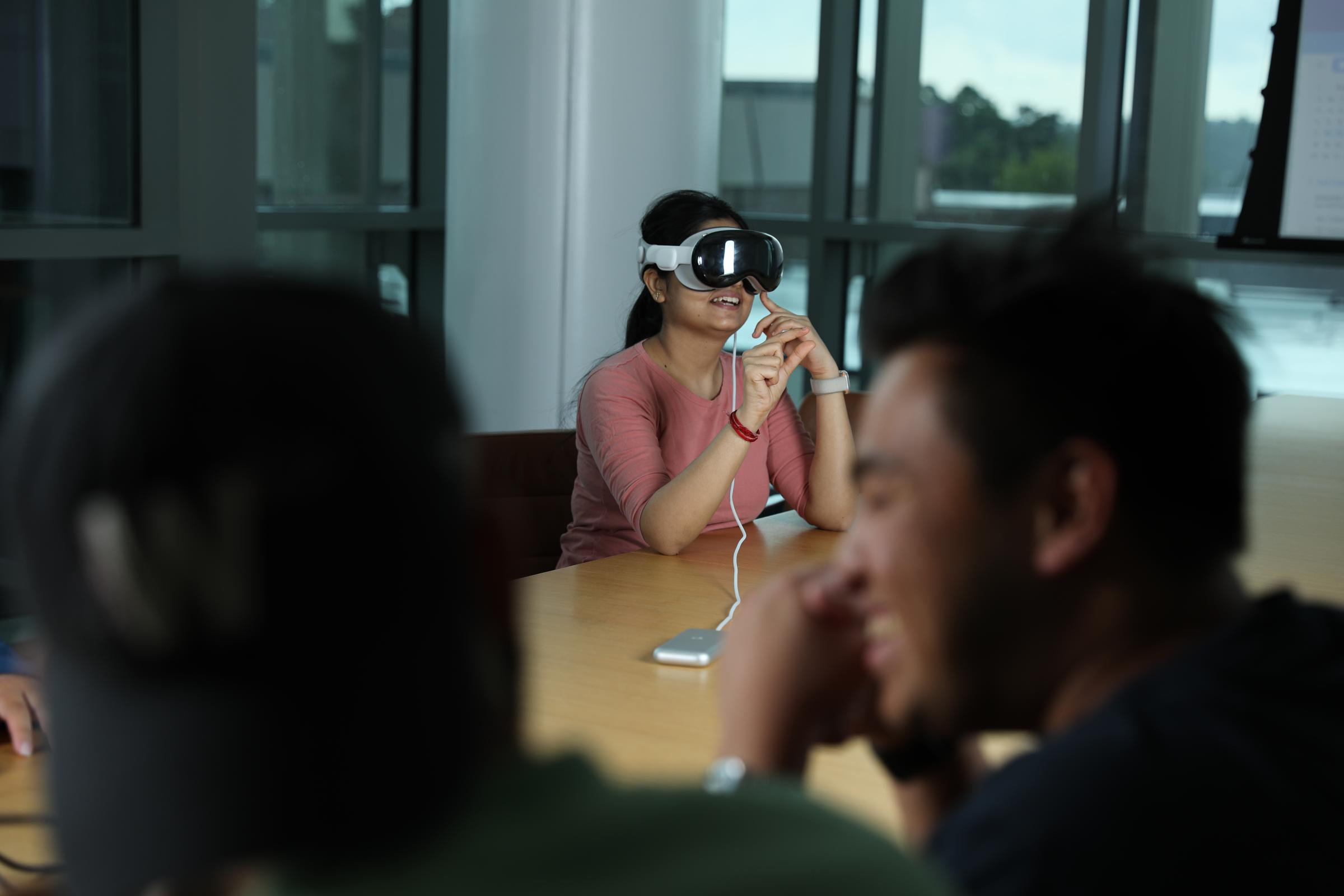 Duke Engineering  - Amanda Randles lab pose for images with the Apple Pro...