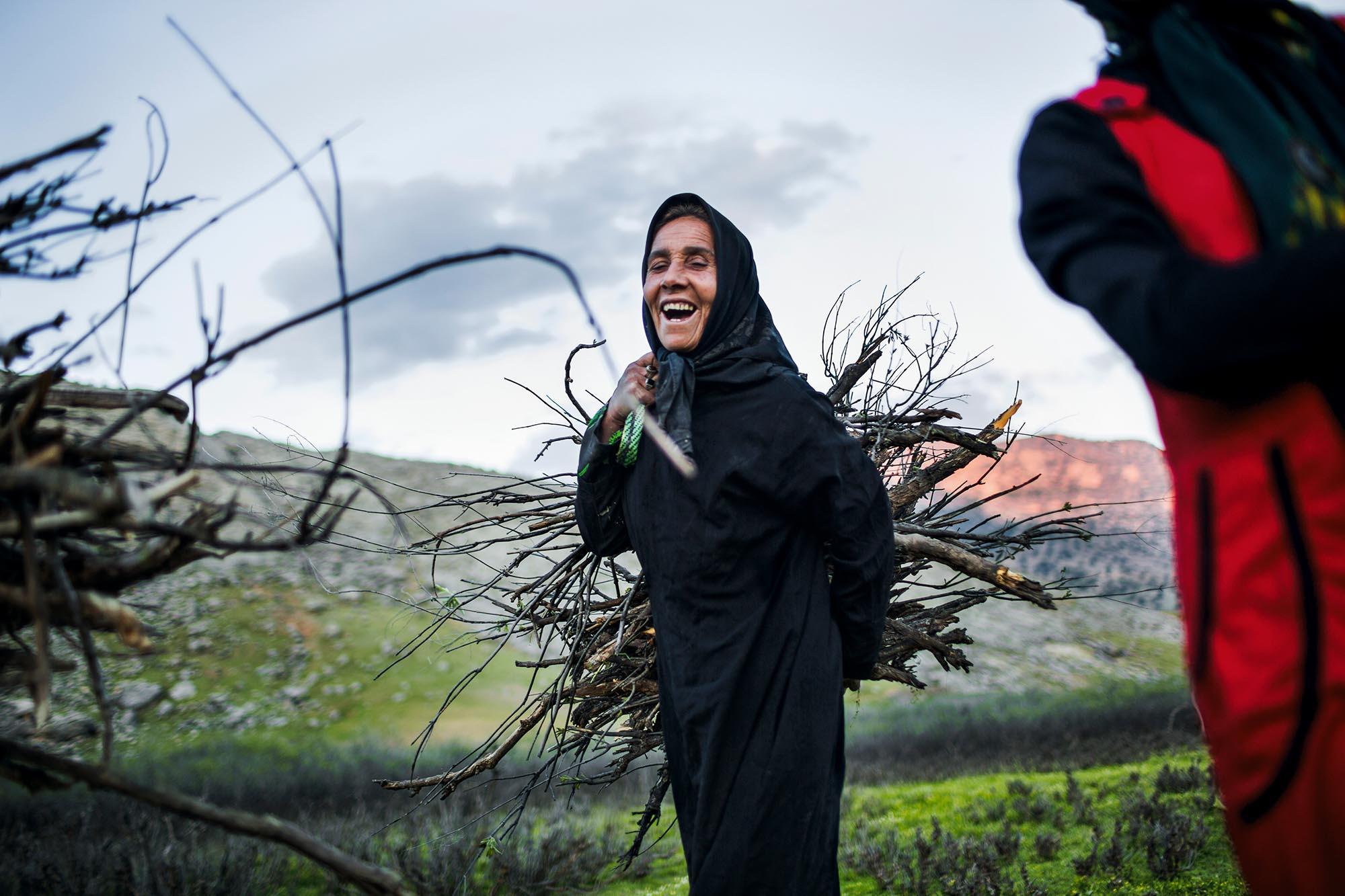 The last & lost nomades of Iran - Women are in charge of the fire. Here Sanbar is bringing...