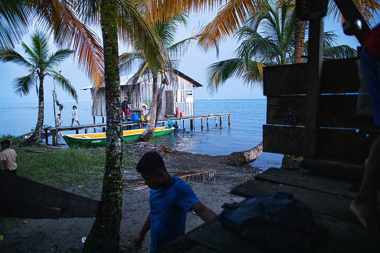 Beyond blue water - Housing at Cayo de Agua Island. Bocas del Toro. Panama....