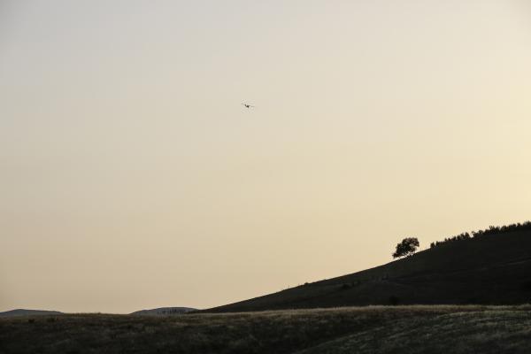 Flying over the hills | Buy this image