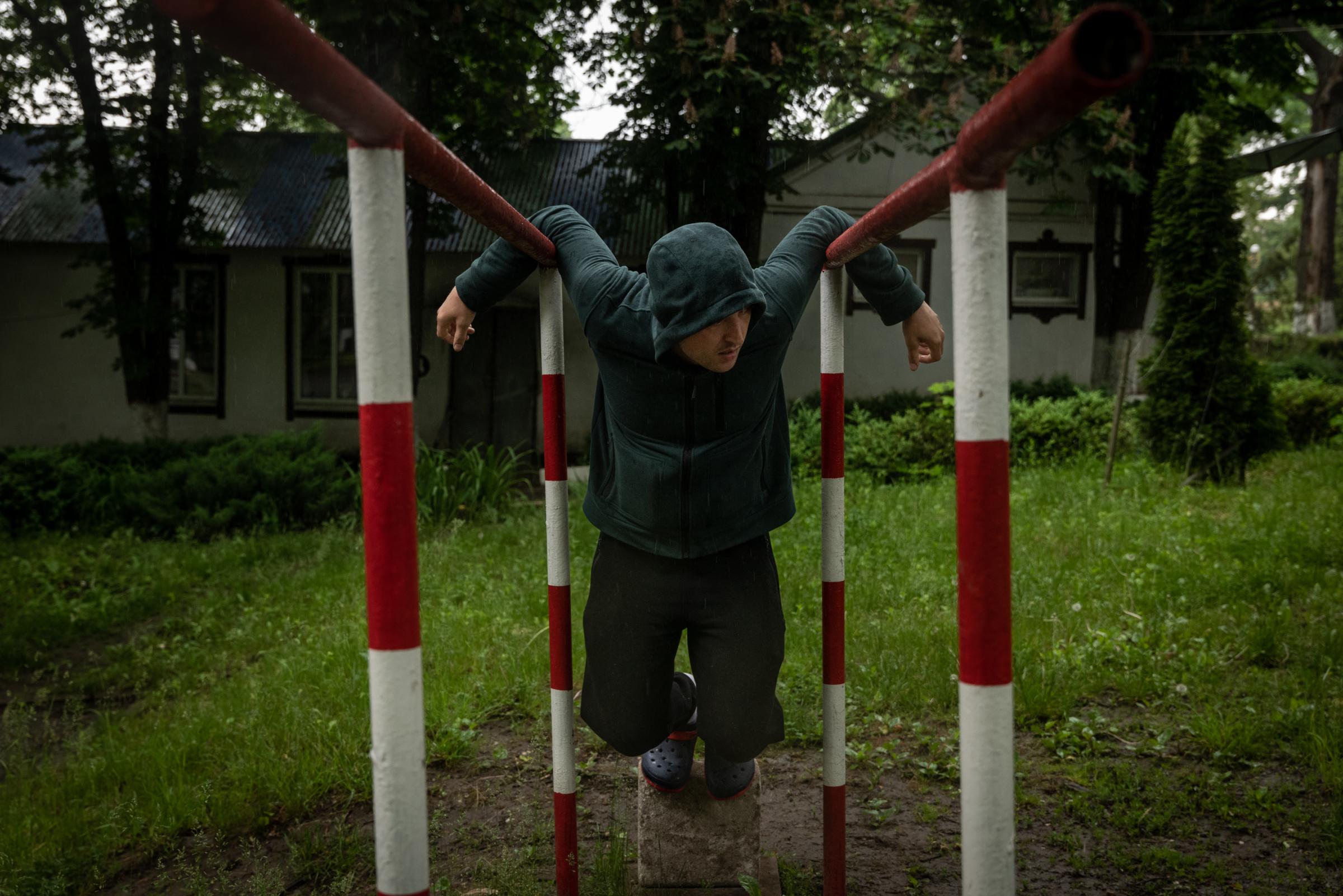 The Hidden Trauma of Ukraine's Soldiers - Vladyslav Ruziev is seen during a break in various...