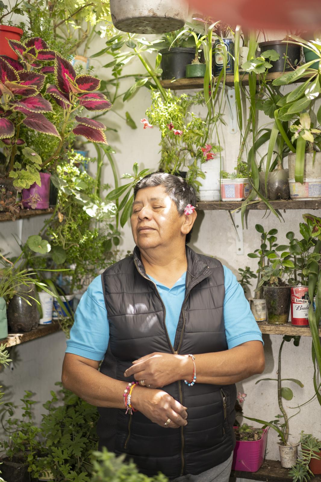 Cleanest neighborhood - 15/03/22. Portrait of Ligia Sanabria (61) in her home garden that she has built for 30 years....