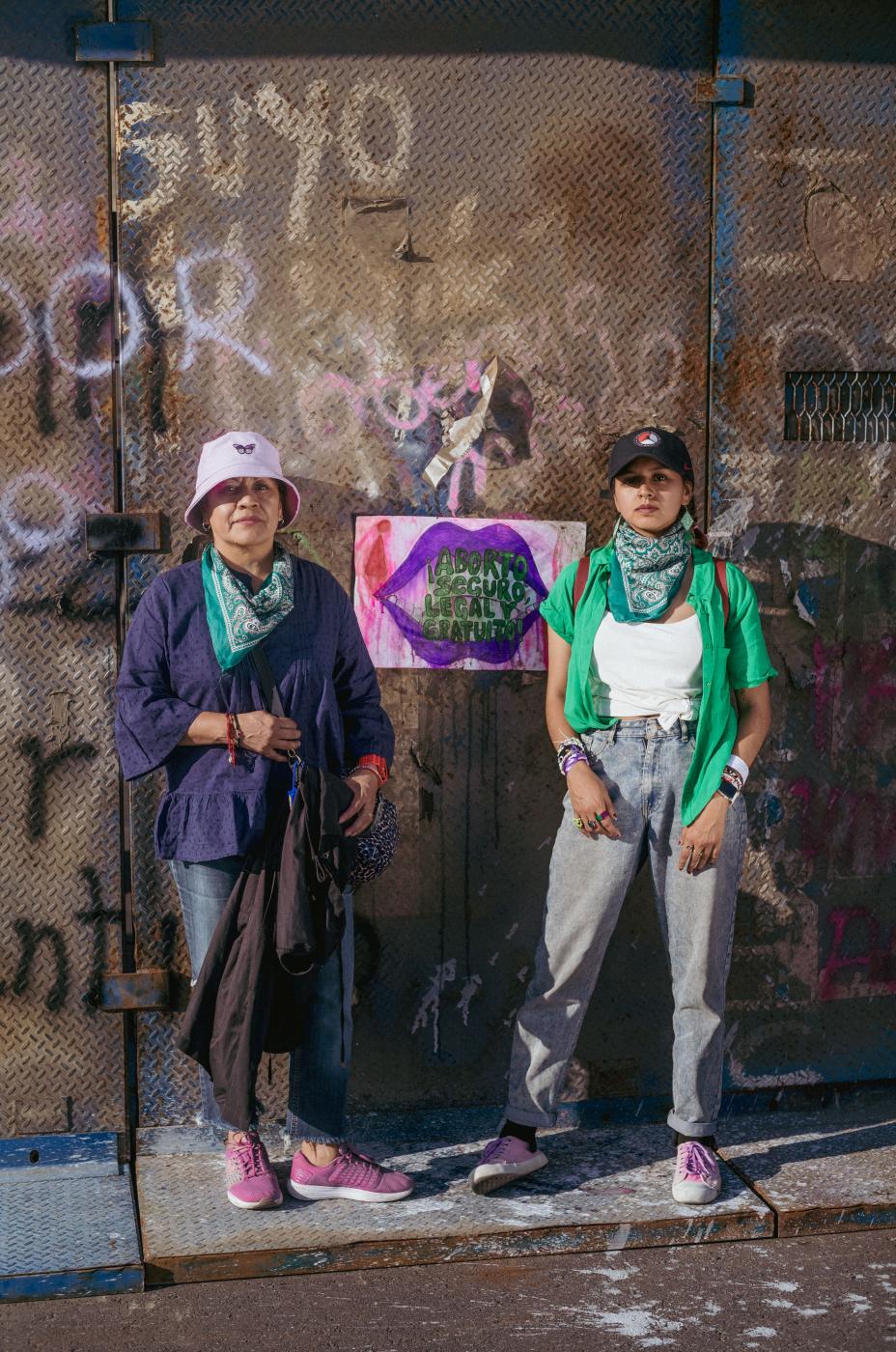 Fuego Feminista - Miriam and Rene (mother and daughter), pose for a...