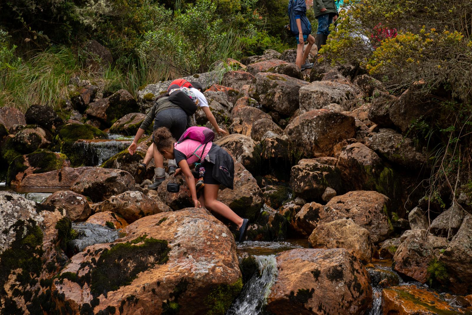 Middle school students hiking up the river in the RNSC El Zoque. To respect UNICEF&#39;s...