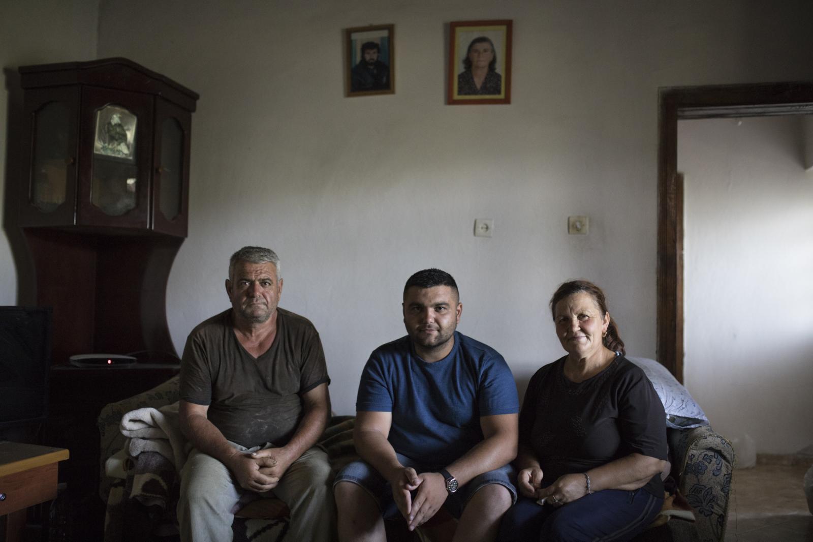 Albania Unemployment - Novruz Jahaj and his wife Liliana pose for a picture with...