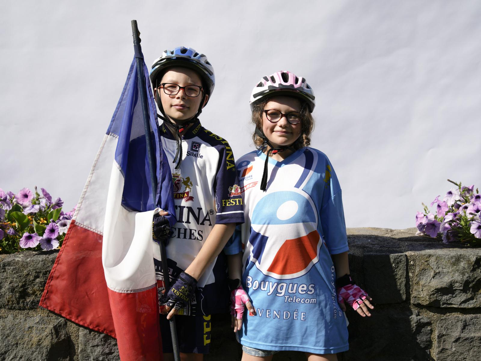 Tour De France - Melvin and Luna Oliveira pose for a portrait in Le...