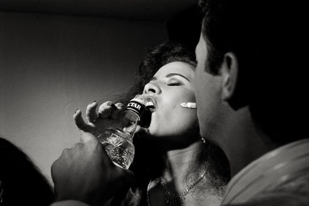  Aguardiente shots backstage at the beginning of the Miss Light pageant, Mesitas del Colegio, Colombia. 