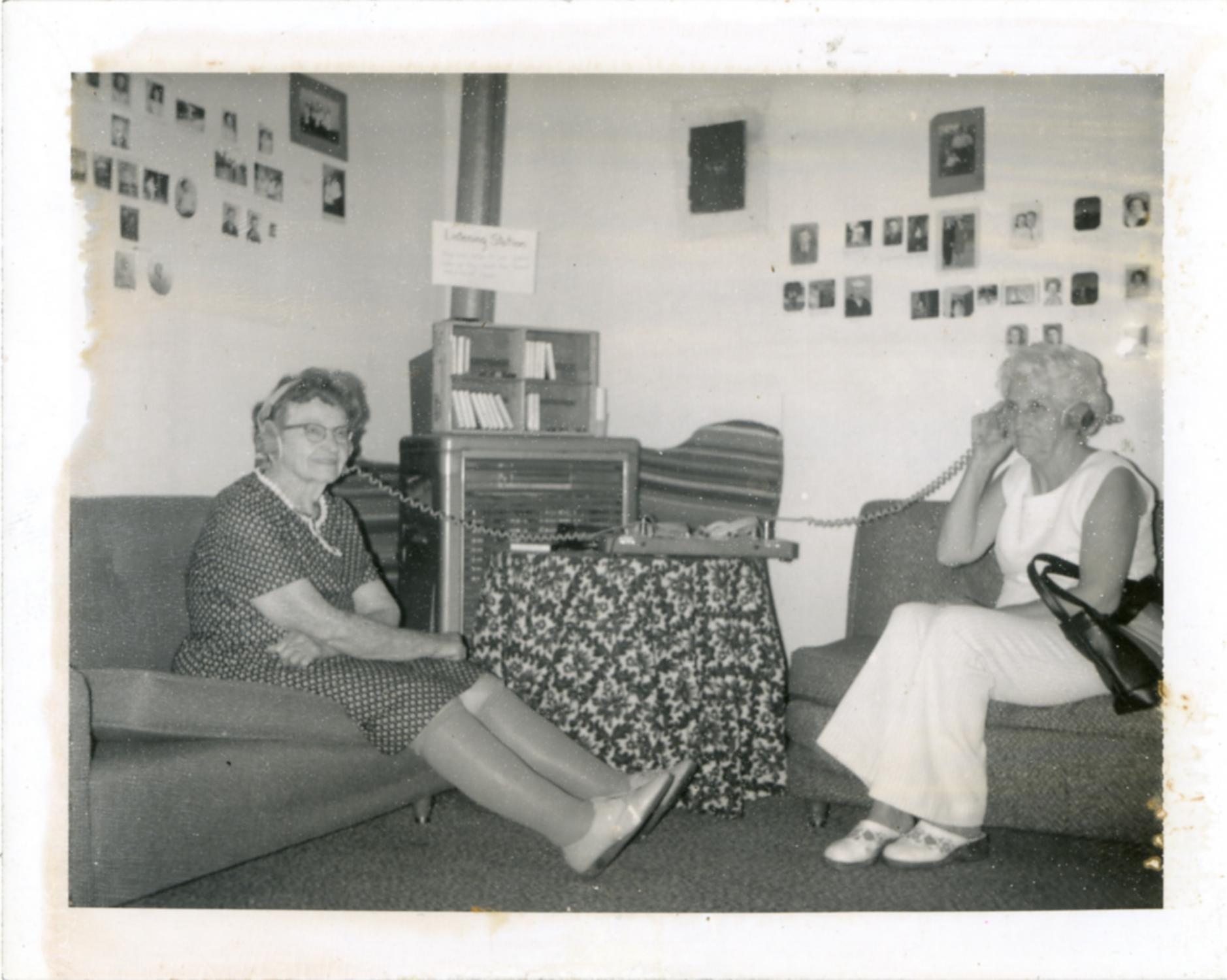 A Photographic Genealogy - The History of Lando - Mrs. Mary Stevenson (L) and Ms Ruth Mosley listening to...