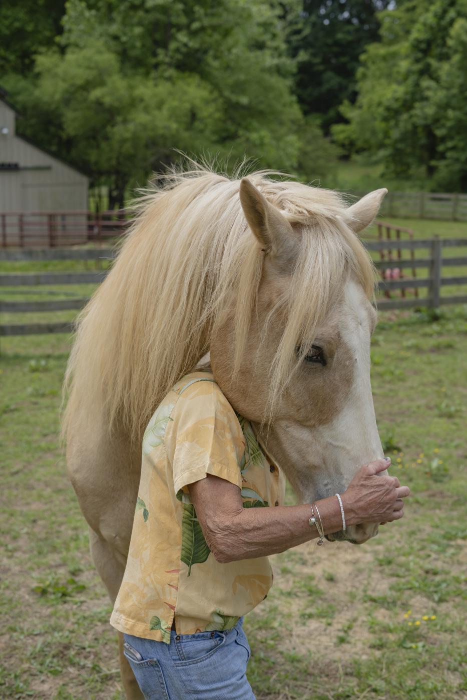 Sherrie Foy caring for her hors...Bernate For Kaiser Health News 