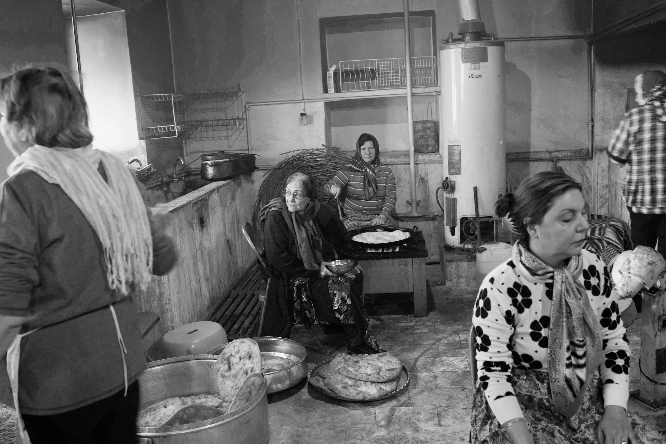 Iraniyat ("being Iranian") -    A group of Zoroastrian women prepare food for the...