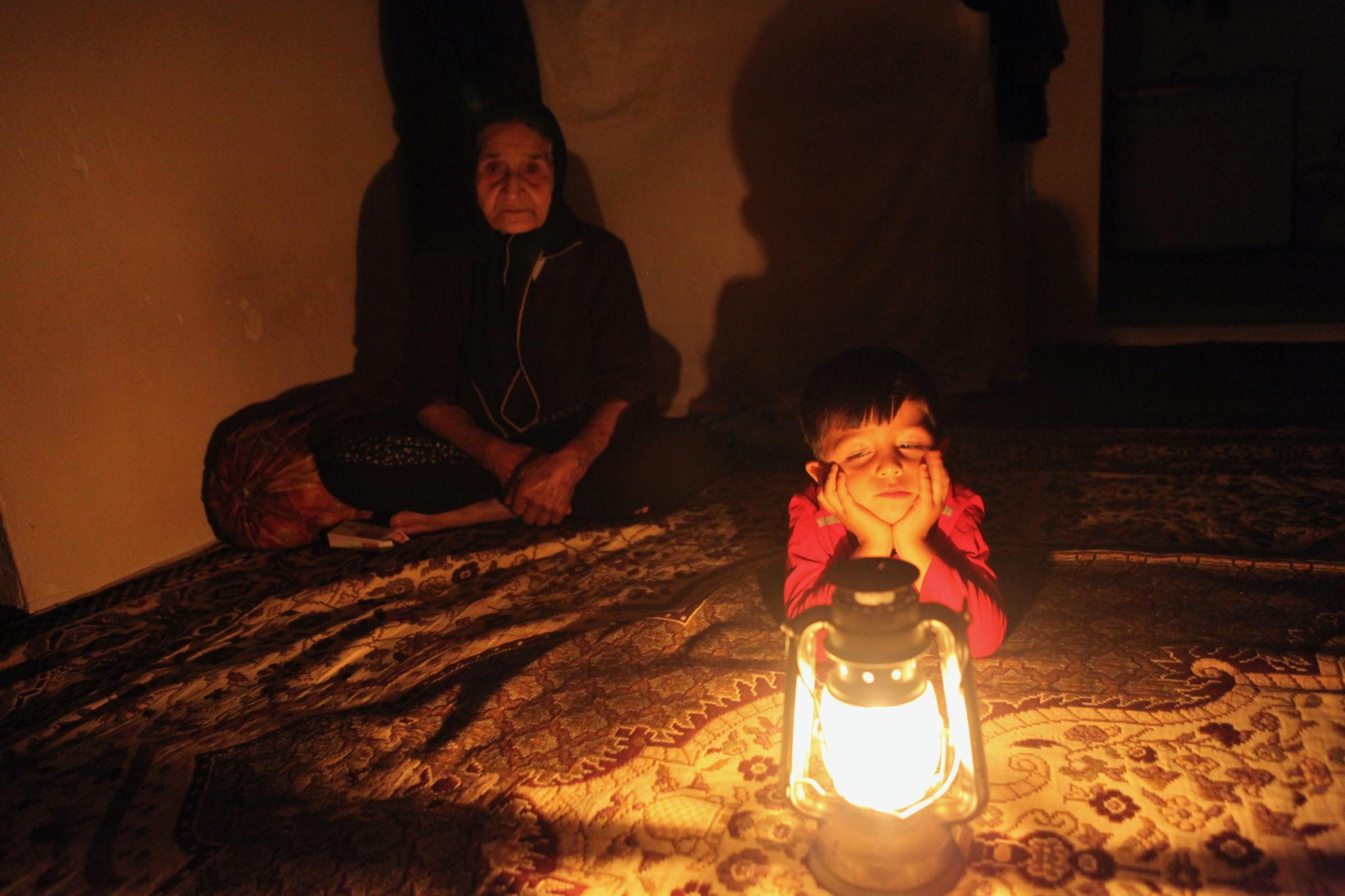 When The Rain Is Dry - The grandmother and the grandson are sitting in darkness...