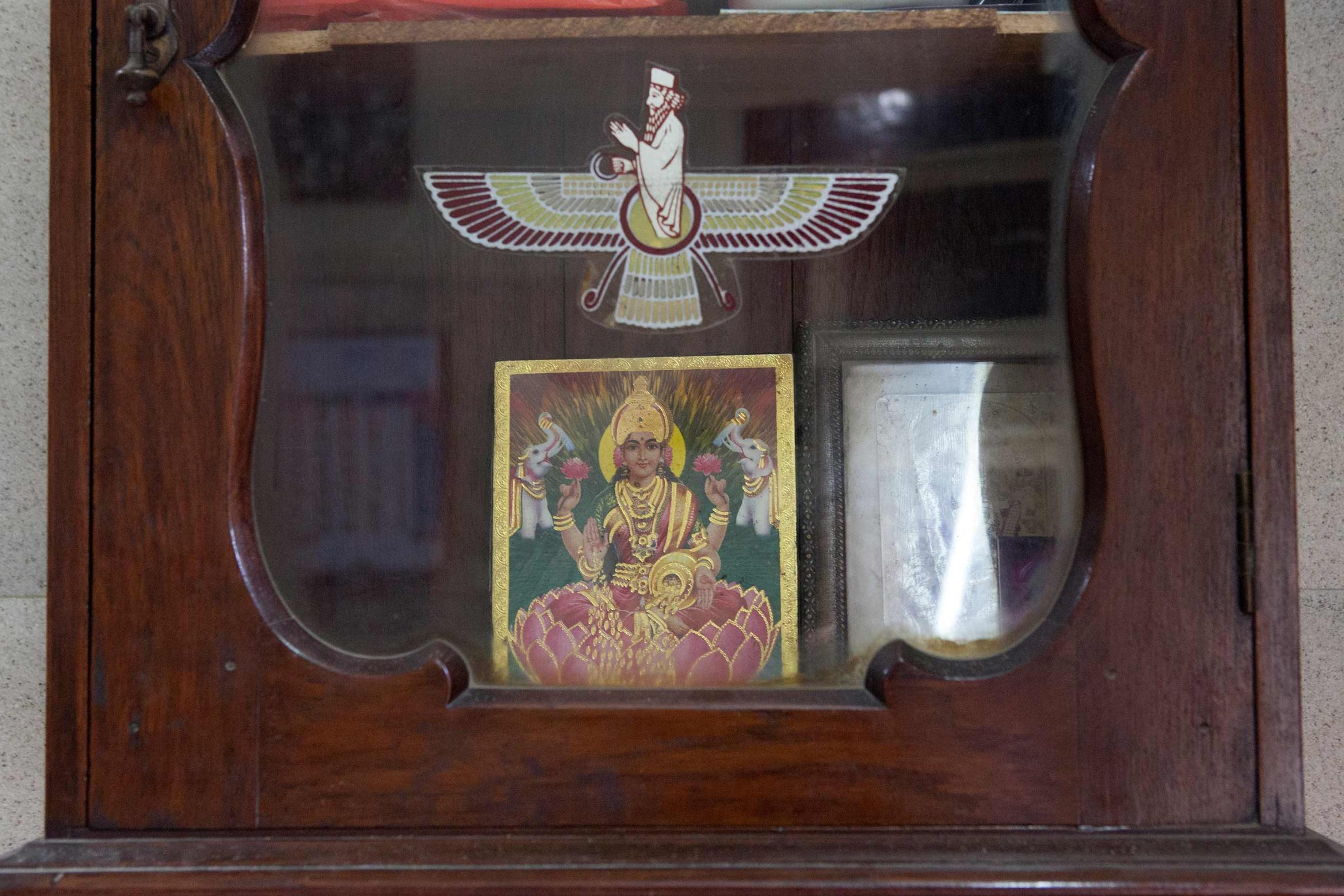 &#39;God is one&#39; is a common idea among Parsis of India, therefore religious icons from non-Zoroastrian religions are also kept in...