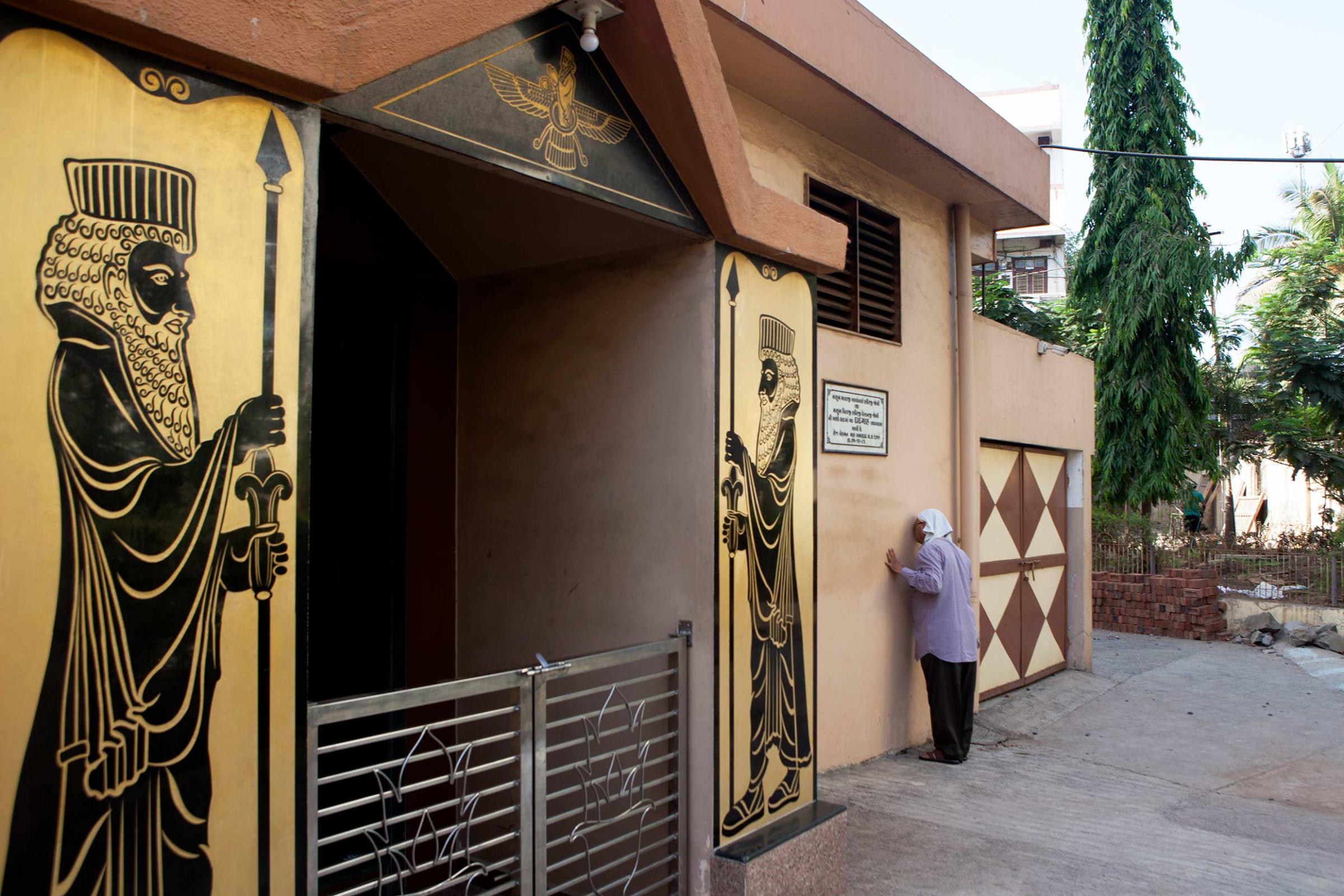 In memory of Greater Iran: The Zoroastrians of Navsari - A Zoroastrian Parsi offer morning prayers outside the...