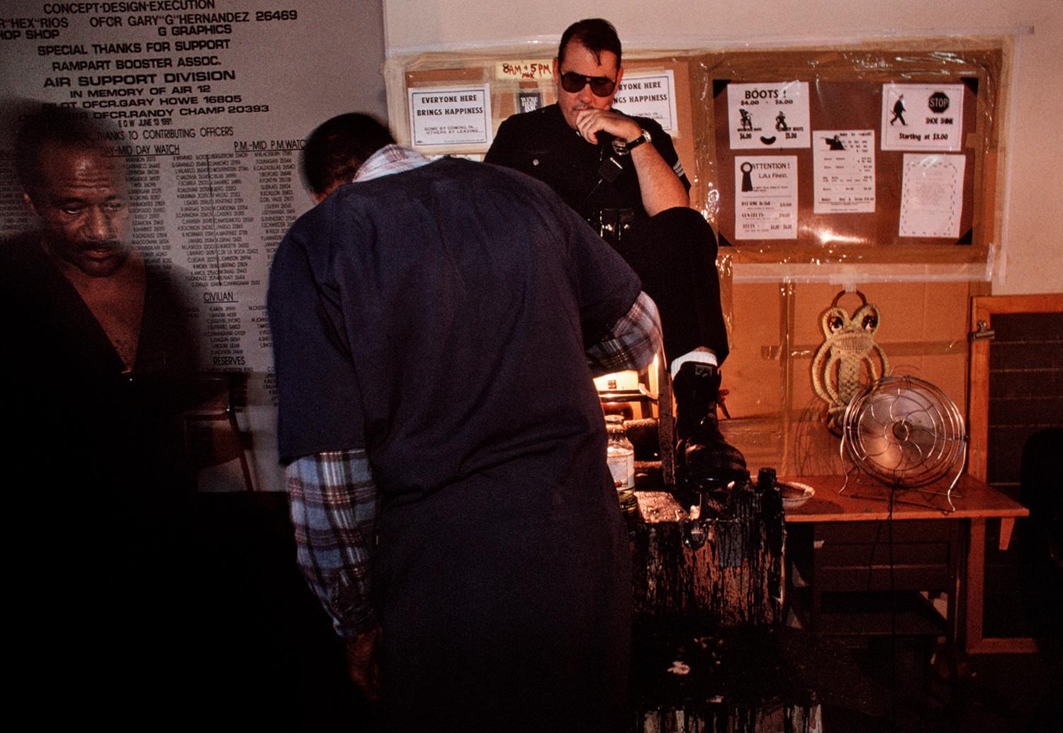  Preparing to head out on patro...sion officer gets a shoeshine. 