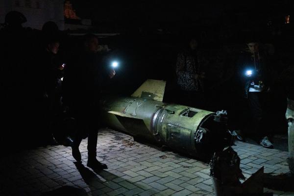 Image from Ukraine Goes Dark - In darkness, Ukrainians exploring destroyed russian...