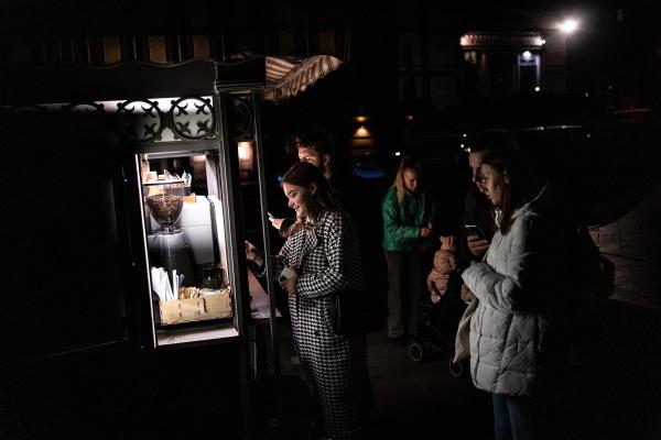 Image from Ukraine Goes Dark - People waiting for coffee in the center of Odesa on...