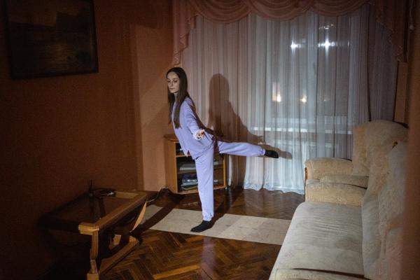 Image from Ukraine Goes Dark - Anastasiia Diachenko, 30, refugee from Kharkiv, teaching...