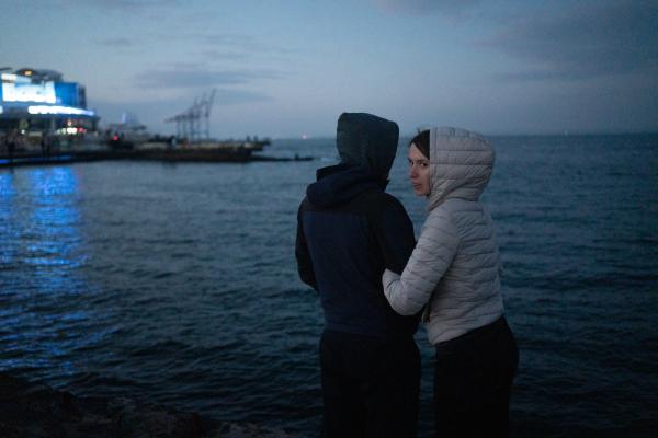 Image from Ukraine Goes Dark - Odesa residents spending time near the Black sea in...