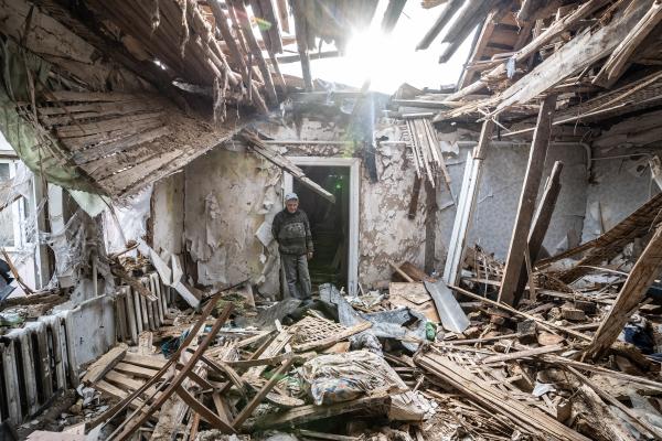 Image from Russian-Ukrainian War - Yura showing around her burned house in Fenevichy, Kyiv...