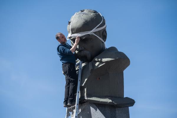 Image from Russian-Ukrainian War - Yaroslav bandaging the monument of Ukrainian poet Taras...