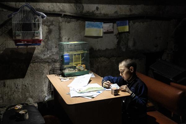 Image from Russian-Ukrainian War - Tymophey, 8, painitng in the basement of the...