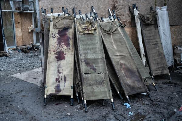 Image from Russian-Ukrainian War - Stretchers covered in blood are seen near milltary...