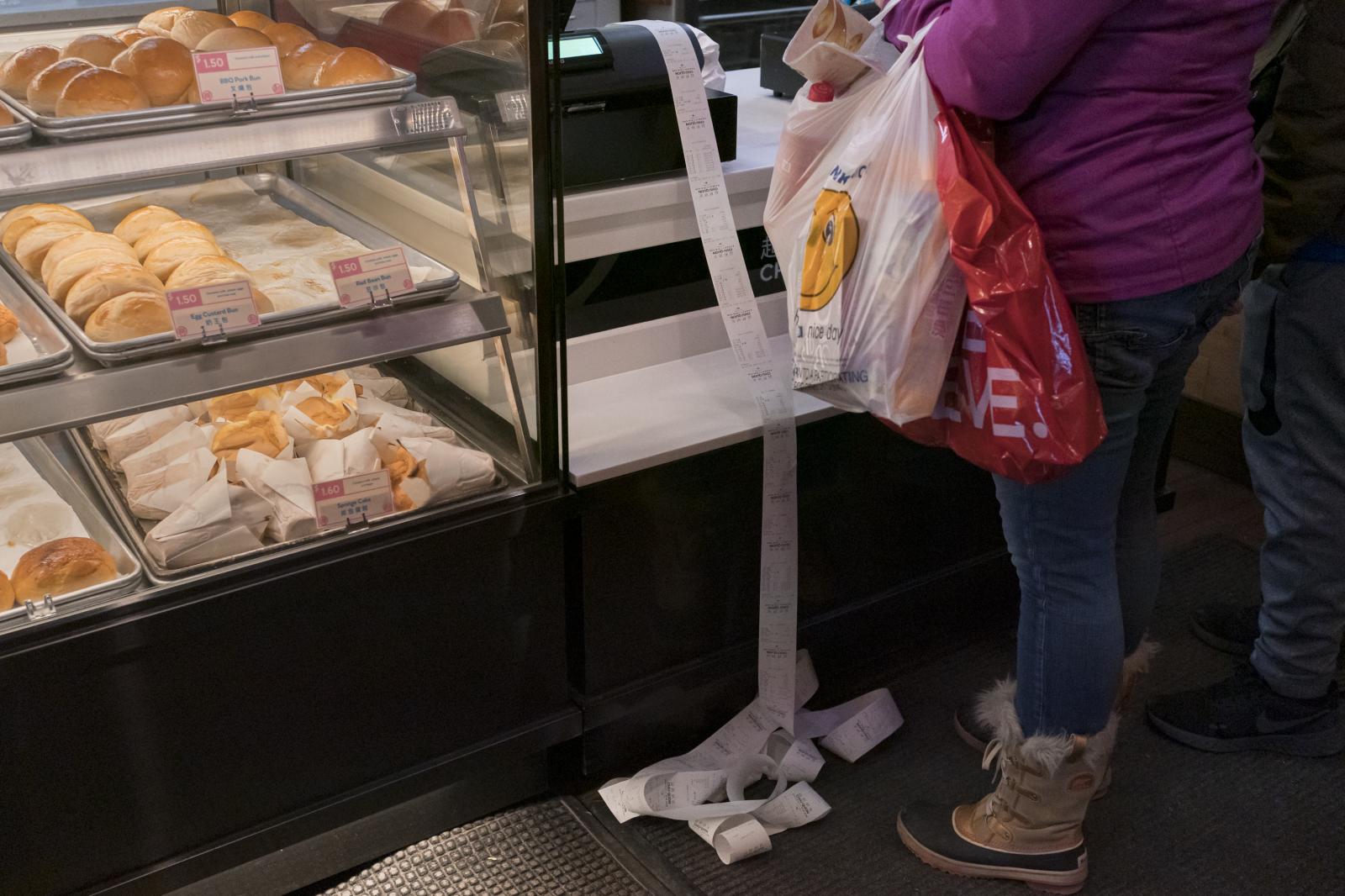 Image from Singles - CHICAGO, IL - JANUARY 22: A long strip of receipts...