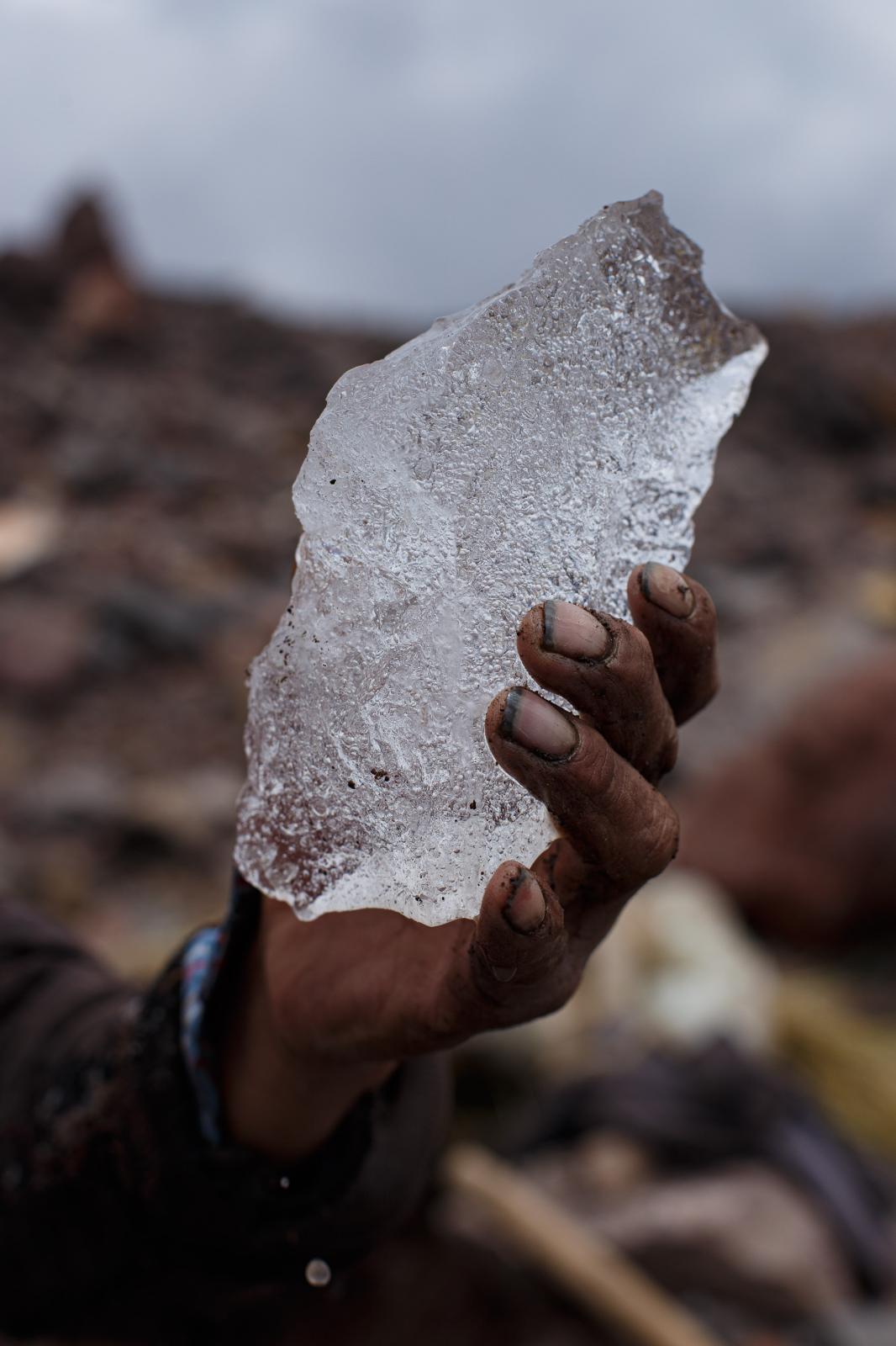 Der Eismann - A piece of ice from the Chimborazo volcano held by the...